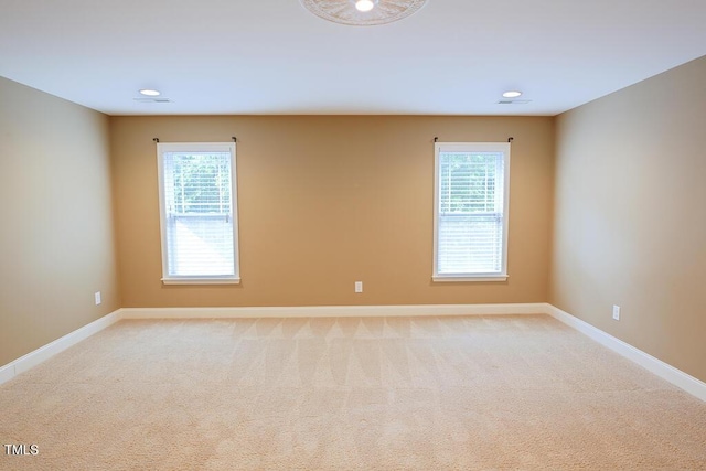 337 Shadowdale Ln, Rolesville, NC 27571 - unfurnished room featuring light colored carpet, healthy amount of natural light, baseboards, and recessed lighting