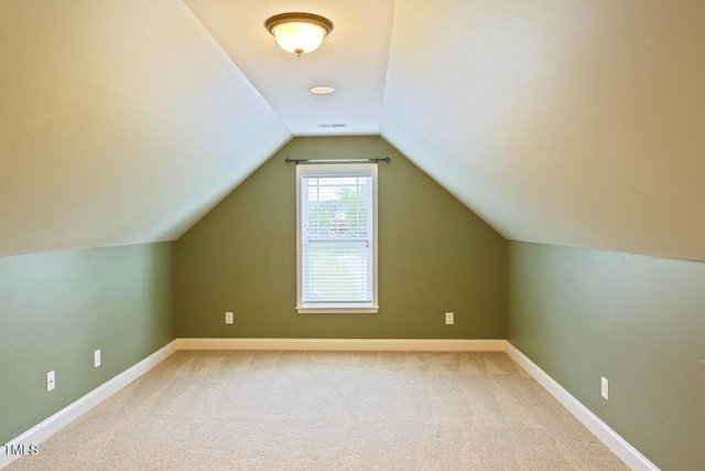 337 Shadowdale Ln, Rolesville, NC 27571 - additional living space featuring light colored carpet, vaulted ceiling, and baseboards