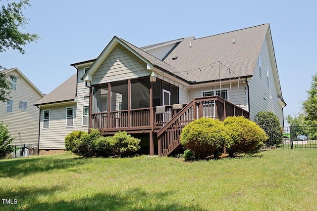 337 Shadowdale Ln, Rolesville, NC 27571 - back of house with a sunroom, roof with shingles, and a deck