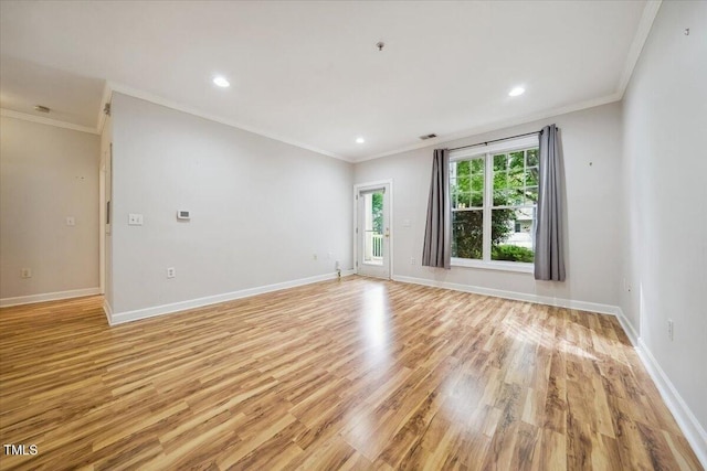 1301 Durlain Dr Unit 103, Raleigh, NC 27614 - spare room featuring light wood-style floors, crown molding, baseboards, and recessed lighting
