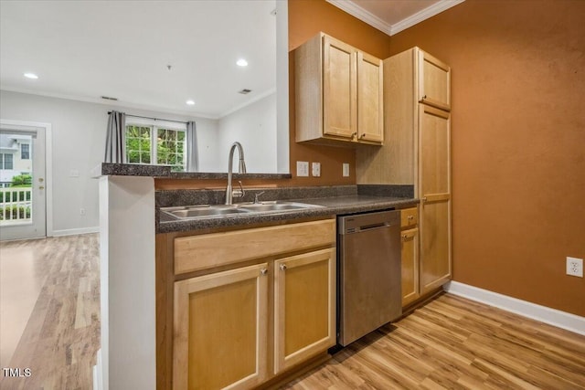 1301 Durlain Dr Unit 103, Raleigh, NC 27614 - kitchen with stainless steel dishwasher, a sink, dark countertops, ornamental molding, and light wood-style floors