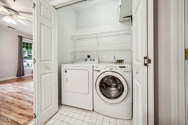 1301 Durlain Dr Unit 103, Raleigh, NC 27614 - laundry area featuring washing machine and clothes dryer, a ceiling fan, and baseboards