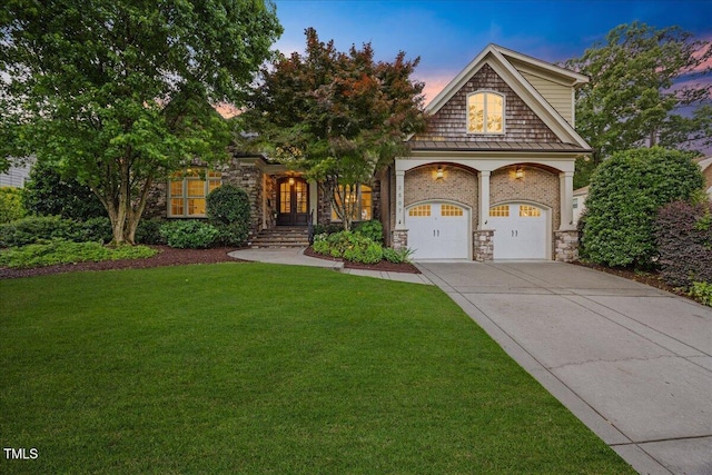 2507 Mayview Rd, Raleigh, NC 27607 - view of front of property with concrete driveway, a front lawn, stone siding, and french doors