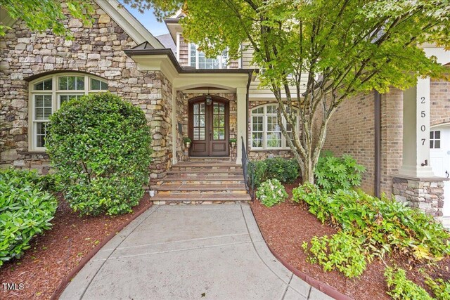 2507 Mayview Rd, Raleigh, NC 27607 - entrance to property featuring stone siding and french doors