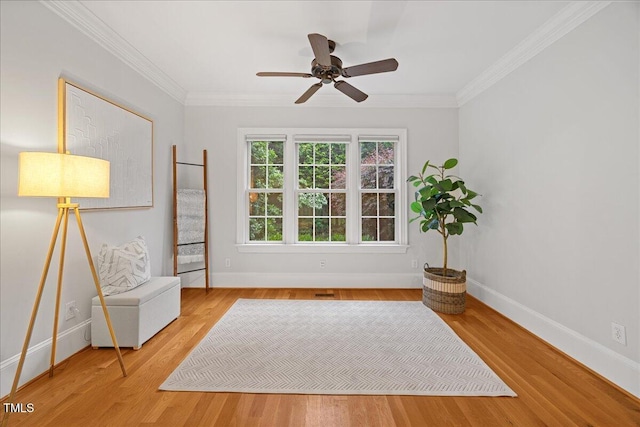 2507 Mayview Rd, Raleigh, NC 27607 - unfurnished room with baseboards, wood finished floors, ornamental molding, and a ceiling fan