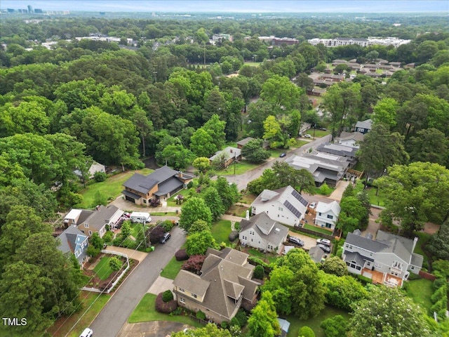 2507 Mayview Rd, Raleigh, NC 27607 - aerial view of property and surrounding area with nearby suburban area and a heavily wooded area