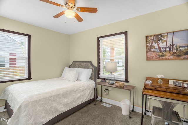 2508 Albany St, Durham, NC 27705 - bedroom with carpet, baseboards, and a ceiling fan