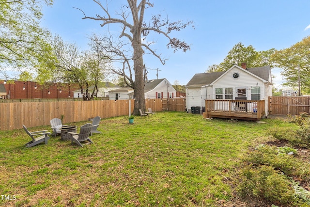 2508 Albany St, Durham, NC 27705 - view of yard featuring a deck and a fire pit
