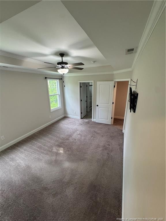 4161 Overhills Rd, Spring Lake, NC 28390 - unfurnished bedroom featuring carpet, ornamental molding, baseboards, and ceiling fan
