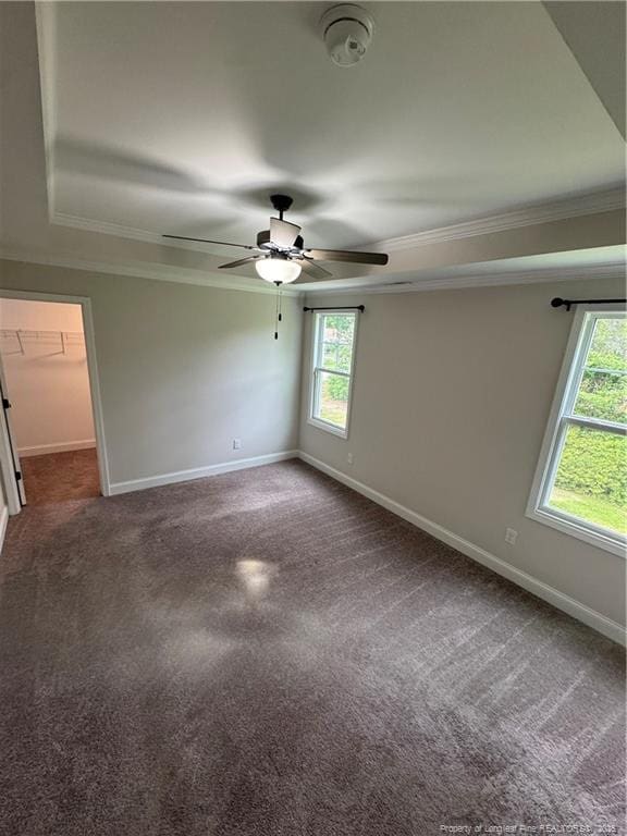 4161 Overhills Rd, Spring Lake, NC 28390 - spare room featuring crown molding, a ceiling fan, carpet, and baseboards