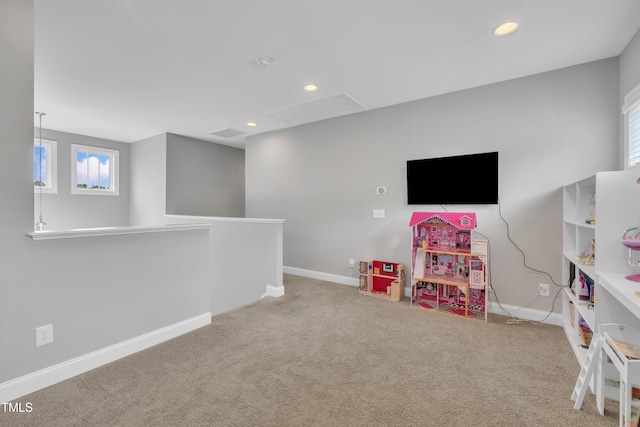 1109 Agio Ct, Zebulon, NC 27597 - recreation room featuring attic access, carpet, baseboards, healthy amount of natural light, and recessed lighting