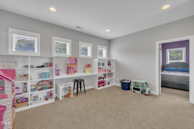 1109 Agio Ct, Zebulon, NC 27597 - recreation room featuring carpet flooring, baseboards, and recessed lighting