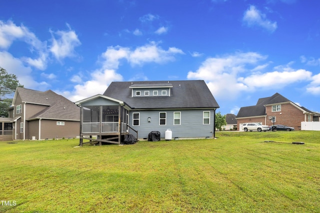 1109 Agio Ct, Zebulon, NC 27597 - back of house featuring a sunroom and a lawn