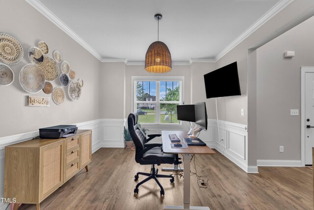 1109 Agio Ct, Zebulon, NC 27597 - home office with light wood-style flooring, crown molding, and a wainscoted wall