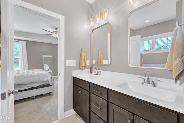 1109 Agio Ct, Zebulon, NC 27597 - full bath featuring ensuite bathroom, healthy amount of natural light, double vanity, and a ceiling fan