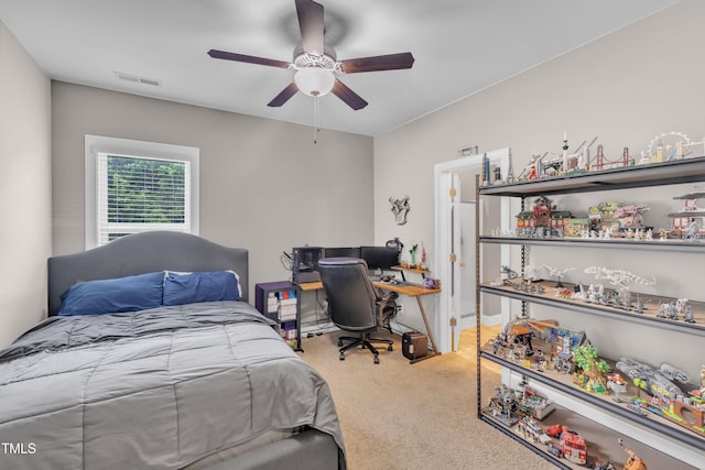 1109 Agio Ct, Zebulon, NC 27597 - carpeted bedroom with a ceiling fan