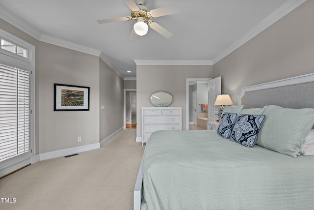 bedroom with baseboards, light carpet, crown molding, a ceiling fan, and connected bathroom