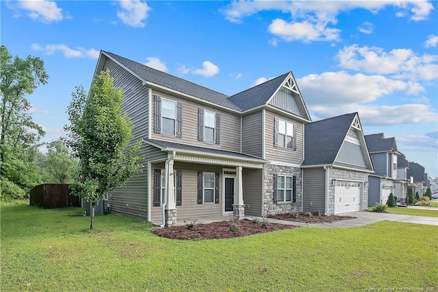craftsman-style house with concrete driveway, a porch, and stone siding
