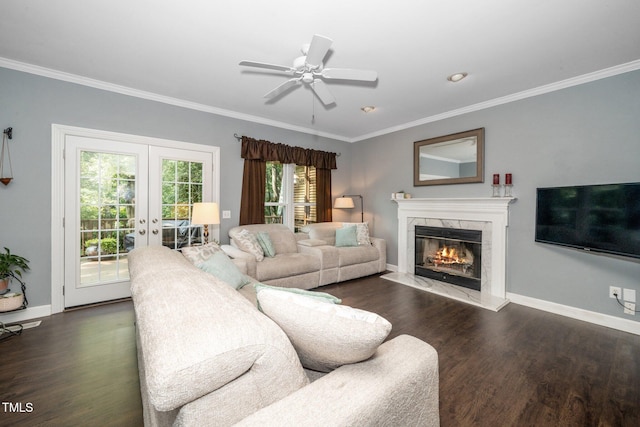 203 W Hill Dr, Cary, NC 27519 - living room with a fireplace, dark wood finished floors, crown molding, french doors, and a ceiling fan