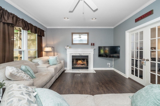 203 W Hill Dr, Cary, NC 27519 - living area featuring a ceiling fan, french doors, wood finished floors, crown molding, and a fireplace