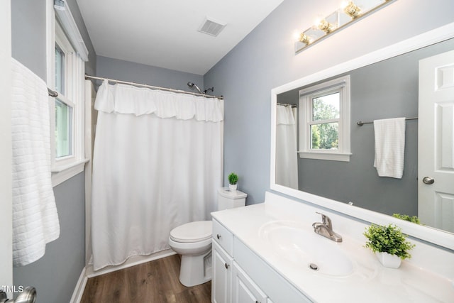 203 W Hill Dr, Cary, NC 27519 - bathroom featuring vanity, wood finished floors, and a shower with shower curtain