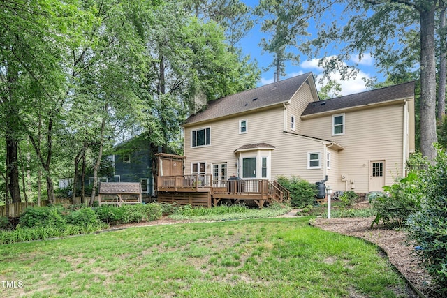 203 W Hill Dr, Cary, NC 27519 - rear view of house with a deck, a lawn, and a chimney