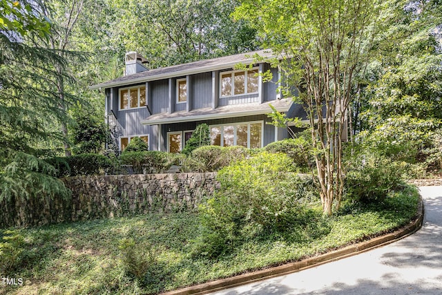 203 Old Forest Creek Dr, Chapel Hill, NC 27514 - view of front of property with a chimney