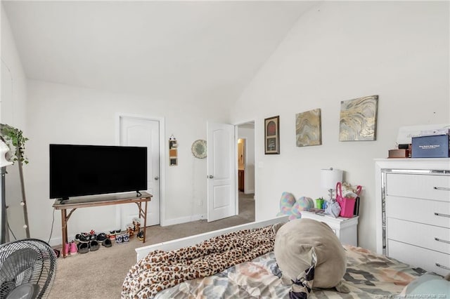 carpeted living room with lofted ceiling and baseboards