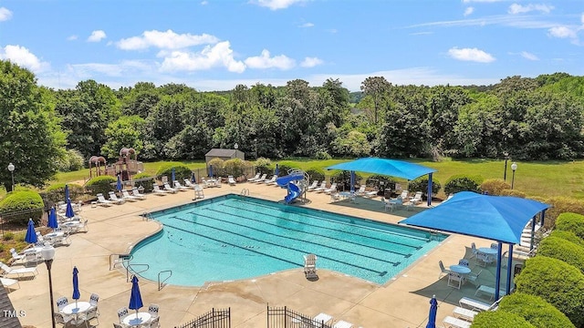 1662 Beechaven Rd, Fuquay Varina, NC 27526 - community pool with a water slide and a patio area