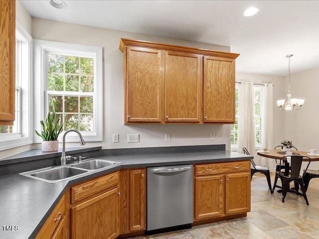 1662 Beechaven Rd, Fuquay Varina, NC 27526 - kitchen with stainless steel dishwasher, a sink, healthy amount of natural light, dark countertops, and recessed lighting