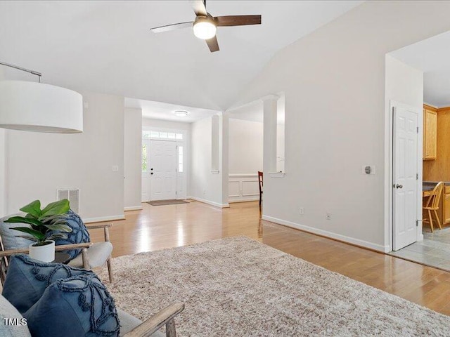 1662 Beechaven Rd, Fuquay Varina, NC 27526 - living area featuring light wood-style flooring, ceiling fan, baseboards, and vaulted ceiling