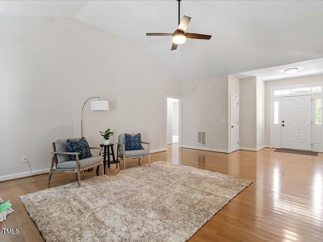 1662 Beechaven Rd, Fuquay Varina, NC 27526 - sitting room featuring lofted ceiling, ceiling fan, light wood-style floors, and baseboards