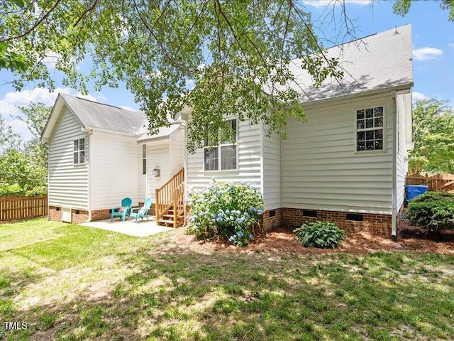 1662 Beechaven Rd, Fuquay Varina, NC 27526 - back of property with crawl space and a patio area