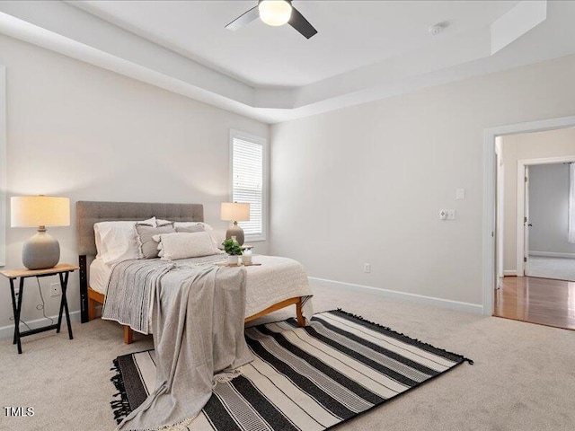 1662 Beechaven Rd, Fuquay Varina, NC 27526 - bedroom with a raised ceiling, carpet, baseboards, and ceiling fan