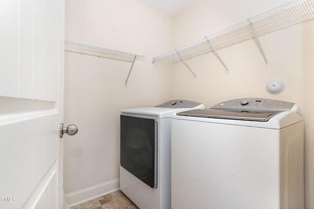 3904 Freemark Ln, Fuquay Varina, NC 27526 - laundry area featuring separate washer and dryer and baseboards