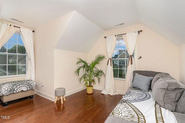 3904 Freemark Ln, Fuquay Varina, NC 27526 - sitting room featuring wood finished floors, lofted ceiling, and baseboards