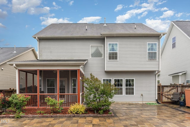 3904 Freemark Ln, Fuquay Varina, NC 27526 - back of property featuring a sunroom, a patio, fence, and a gate