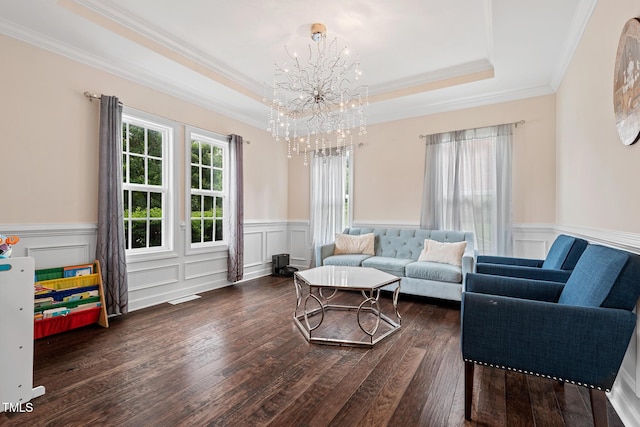 200 Vintage Hill Cir, Apex, NC 27539 - living area with ornamental molding, a wainscoted wall, a chandelier, dark wood-style flooring, and a raised ceiling