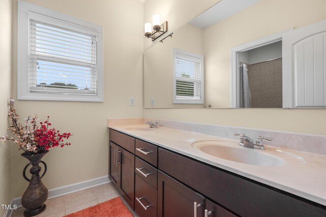 200 Vintage Hill Cir, Apex, NC 27539 - full bathroom with double vanity, tile patterned flooring, baseboards, and curtained shower