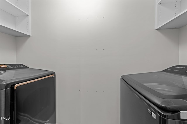 9164 Wooden Rd, Raleigh, NC 27617 - laundry room with washer and dryer