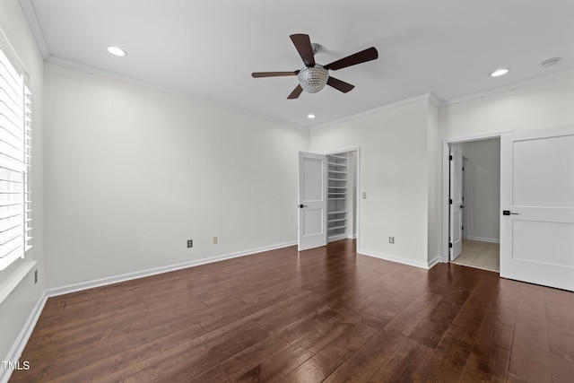 9164 Wooden Rd, Raleigh, NC 27617 - unfurnished bedroom with crown molding, multiple windows, wood finished floors, baseboards, and recessed lighting