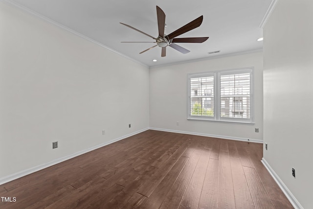 9164 Wooden Rd, Raleigh, NC 27617 - empty room with ceiling fan, dark wood finished floors, ornamental molding, baseboards, and recessed lighting