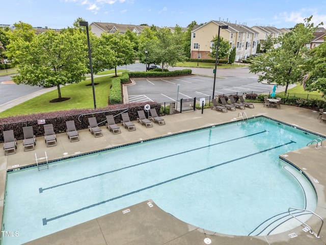 9164 Wooden Rd, Raleigh, NC 27617 - community pool with a patio area