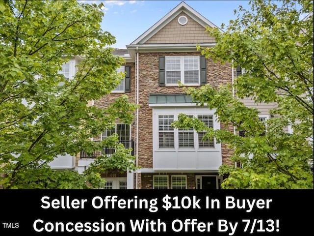 9164 Wooden Rd, Raleigh, NC 27617 - view of front of property with stone siding
