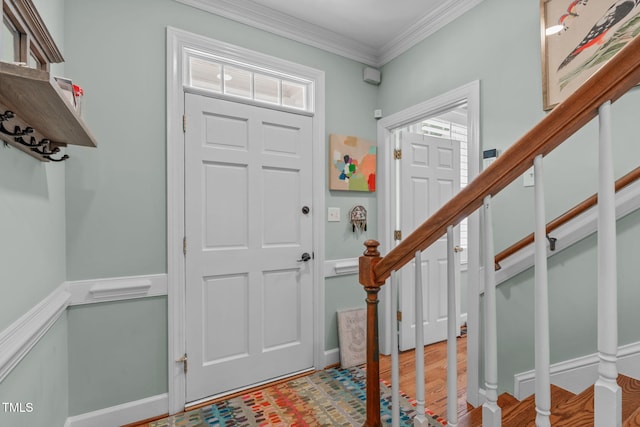 1813 Carrington Dr, Raleigh, NC 27615 - foyer entrance with stairway, crown molding, and baseboards