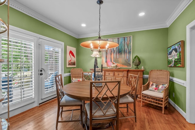 1813 Carrington Dr, Raleigh, NC 27615 - dining room with ornamental molding, wood finished floors, recessed lighting, wainscoting, and baseboards