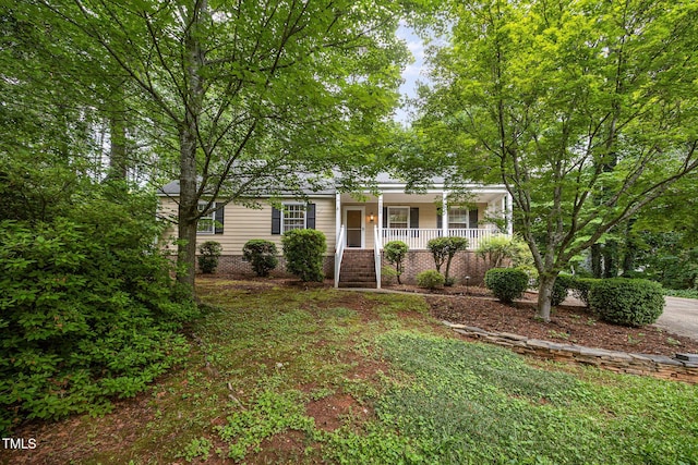 5804 Heatherbrook Cir, Raleigh, NC 27612 - view of front of home featuring covered porch