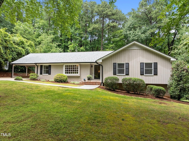 1706 Rangecrest Rd, Raleigh, NC 27612 - view of front of house featuring a front lawn and a carport