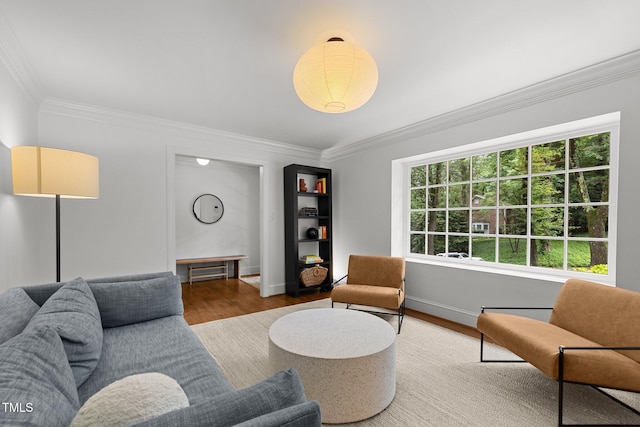 1706 Rangecrest Rd, Raleigh, NC 27612 - living room with wood finished floors, crown molding, and baseboards