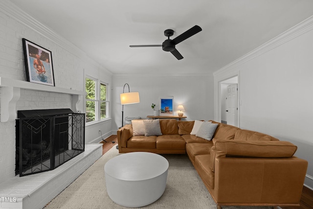 1706 Rangecrest Rd, Raleigh, NC 27612 - living room featuring a ceiling fan, ornamental molding, wood finished floors, a fireplace, and baseboards